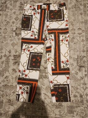 Avenue White Skinny Pants with Black, Orange & Gold Chain Print